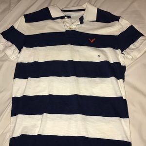 White/navy blue polo shirt